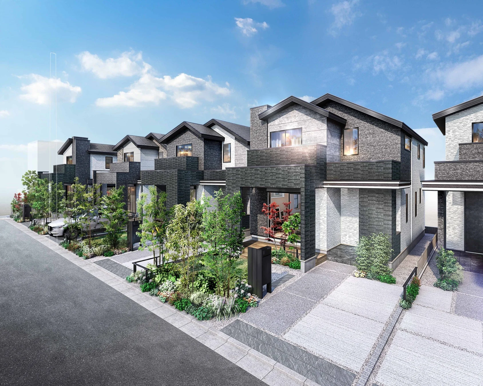 モダンなデザインの戸建て住宅が並ぶ街並み