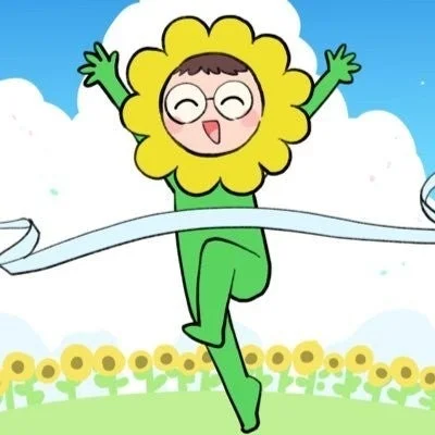 ひまわりの着ぐるみを着たキャラクターが、満面の笑みでゴールテープを切っているイラスト